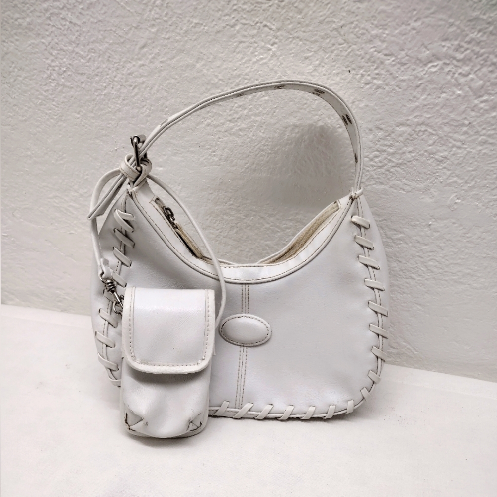 Women's white faux leather small handbag with smaller carrying case